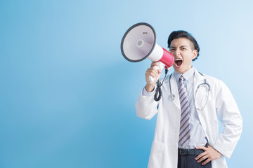 Wall Mural - male doctor take microphone