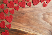 Red Sparkle Valentine's Hearts Border Cherry Wood Grained Backgr