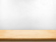 Wood table top with white paint concrete wall,Mock up template f