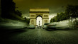 Triumphal Arch in Paris with traffic cars from Champs Elysees