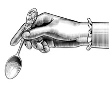 Woman's Hand With A Spoon