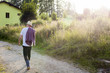 © Lumi Images - Senior farmer walking home in the evening