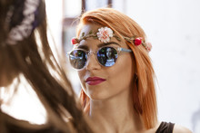 Close-up Of A Young Woman In Hippie Style
