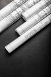 © fotofabrika - Construction planning drawings on black background