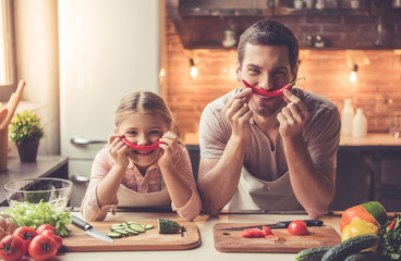 Wall Mural - Father and daughter cooking