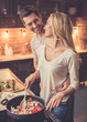 © georgerudy - Beautiful couple cooking
