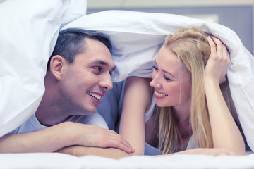 Canvas Print - happy couple sleeping in bed