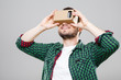 Man looking at Virtual Reality Glasses