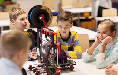 Wall Mural - happy children with 3d printer at robotics school