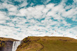 © Ryan Longnecker - Waterfall and hang gliders