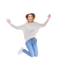 Wall Mural - Pretty teenager girl  jumping on white background