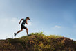 © torwaiphoto - Male Runner of Trail. He was running fast on the mountain