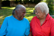 © digitalskillet1 - Happy mature African American sisters laughing and smiling.