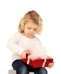 Poster - Small blond child with a red present