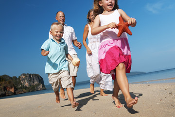 Canvas Print - Family Father Mother Son Daughter Beach Fun Concept