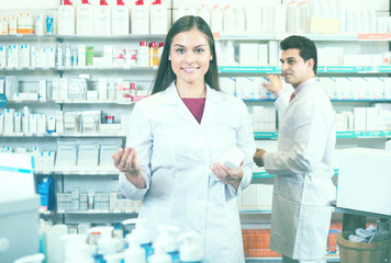 Wall Mural - pharmacists  posing in drugstore