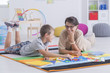 © Photographee.eu - Tutor and child learning together