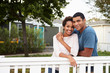 © Monkey Business - Young African American couple embrace outside their house
