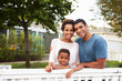 © Monkey Business - Young African American family outside their new house