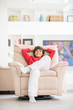 © Jasmin Merdan - Kid relaxed on sofa