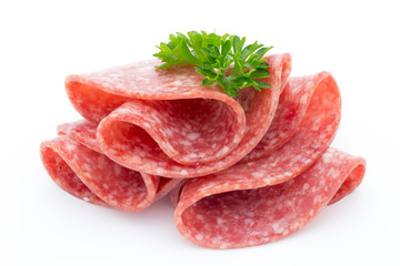 Salami sausage slices isolated on white background.