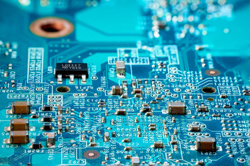 photo of electric component in electronic device, contain small resistor, small capacitor, microchip