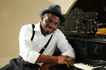 Wall Mural - Afro American man playing piano