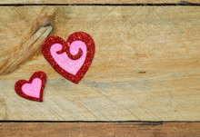 Sparkle, Glitter, Twinkling Pink And Red Hearts On Pallet Wood Background.  Valentines Day, Wedding, Anniversary.  Romantic Symbol Of Love.