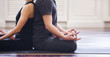 © 4frame group - Young couple meditating together