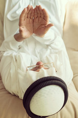 Wall Mural - Elderly Muslim Arabic man praying