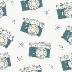 Seamless pattern with vector retro hand drawn hipster photo camera and stars. Vintage illustration for design, print for t-shirt, poster, card.