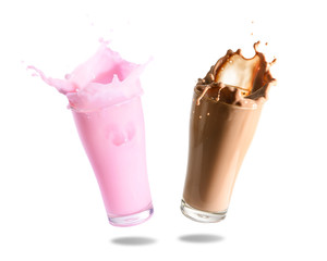 Strawberry milk and chocolate milk splashing out of glass., Isolated white background.