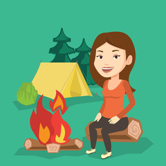 Sticker - Woman sitting on log near campfire in the camping.