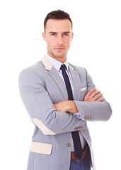 Wall Mural - Portrait of young business man with crossed arms