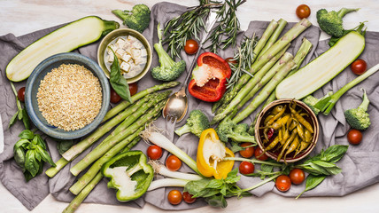 Wall Mural - Various ingredients for tasty vegetarian cooking with organic vegetables, pearl barley and feta cheese, top view. Healthy clean food or diet nutrition concept