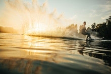 Man Wakeboarding On A Lake