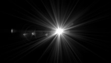 Lens Flare Light Over Black Background. Easy To Add Overlay Or S