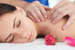 © cameravit - Woman enjoying a wellness neck massage in a spa. Health, beauty, resort and relaxation concept.