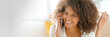 © goodluz - Beautiful mixed race woman talking on phone, template