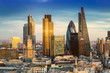 London, England - Business district with famous skyscrapers and landmarks at golden hour