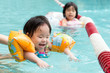 © Kenishirotie - Little Asian toddler swimming