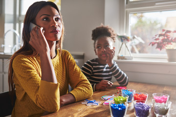 Wall Mural - Mother talking on phone forgetting child