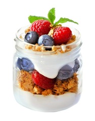 Wall Mural - healthy blueberry and raspberry parfait in a mason jar isolated on a white background