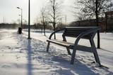 Fototapeta Most - Bench in the country covered by snow during winter. Slovakia