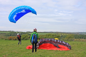 Poster - Paragliders preparing to launch