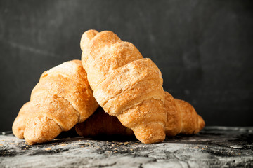 Sticker - Fresh croissant on scratched background