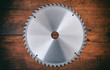 © Rawf8 - Saw blade on wooden background