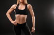 © Africa Studio - Young athletic woman on black background, closeup