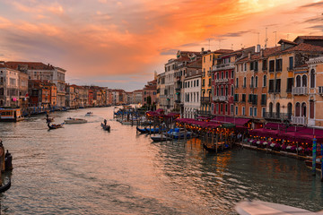 Wall Mural - Sunset view of Grand Canal with gondolas in Venice. Italy