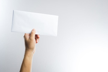 hand holding envelope